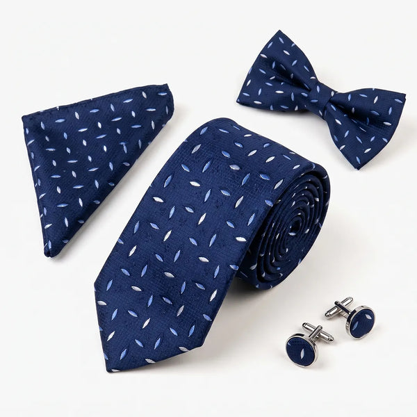 Flat lay of a Sailor Australia navy scatter 4-piece tie set including a tie, pocket square, bow tie, and cufflinks.