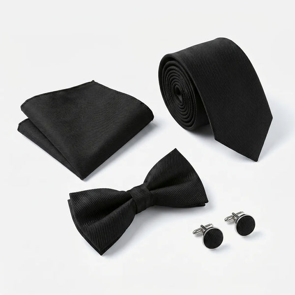 Flat lay of a Sailor Australia black twill 4-piece tie set including a tie, pocket square, bow tie, and cufflinks.