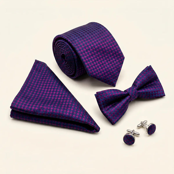 Flat lay of a Sailor Australia purple and navy checkerboard 4-piece tie set including a tie, pocket square, bow tie, and cufflinks.
