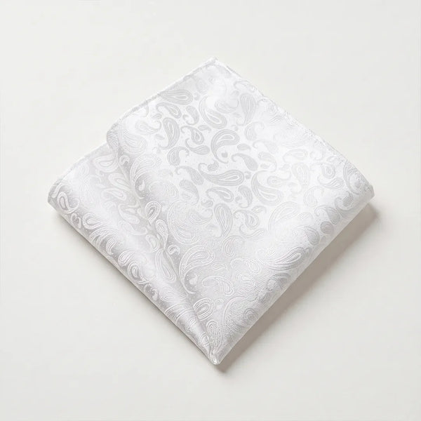 Close-up of a folded white and silver paisley jacquard polyester pocket square.