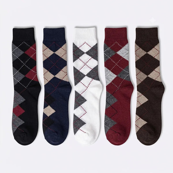 Flat lay of a 5-pack of men's argyle socks in black, navy blue, white, burgundy, and brown.