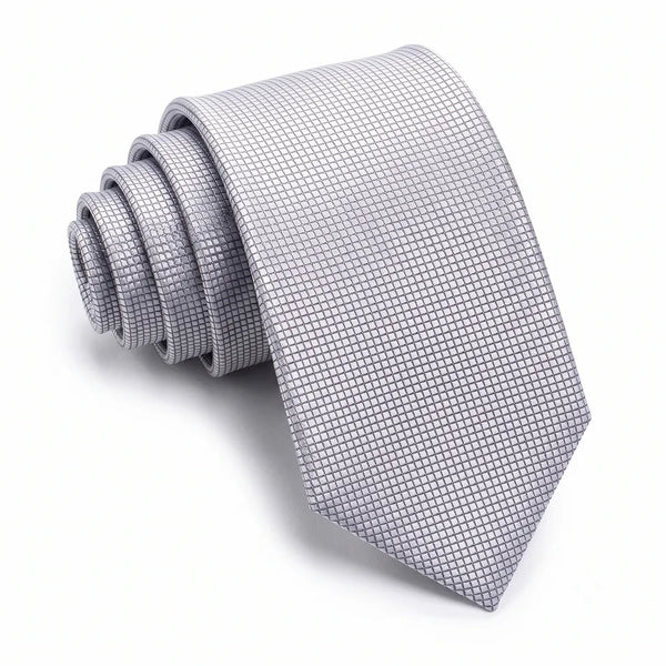 Close-up of a light silver micro-grid patterned necktie featuring a subtle textured surface on a smooth polyester fabric.