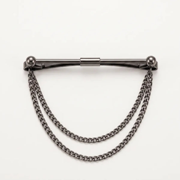 Close-up of a polished dark gunmetal horizontal collar pin with a twisted rope texture and two tiered, draped curb chains.