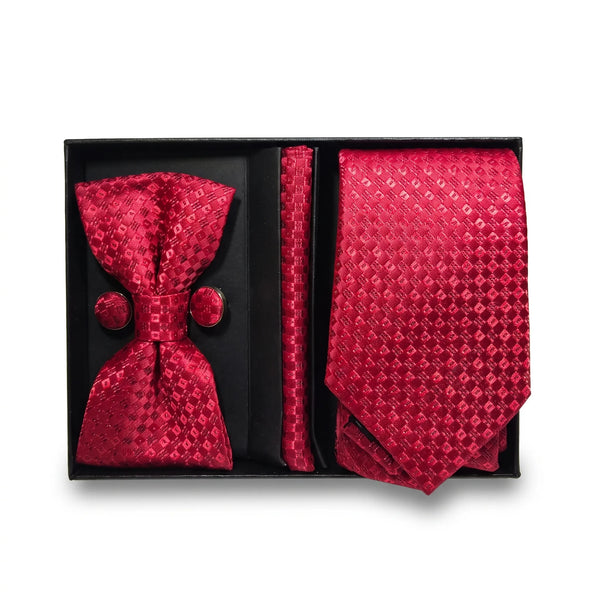 A men's formal accessory set in a black gift box, featuring a red patterned bow tie, matching pocket square, and tie, with two matching red buttons.