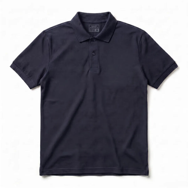 Front flat lay of a classic dark sapphire short-sleeve polo shirt with a two-button placket and ribbed collar on a white background.