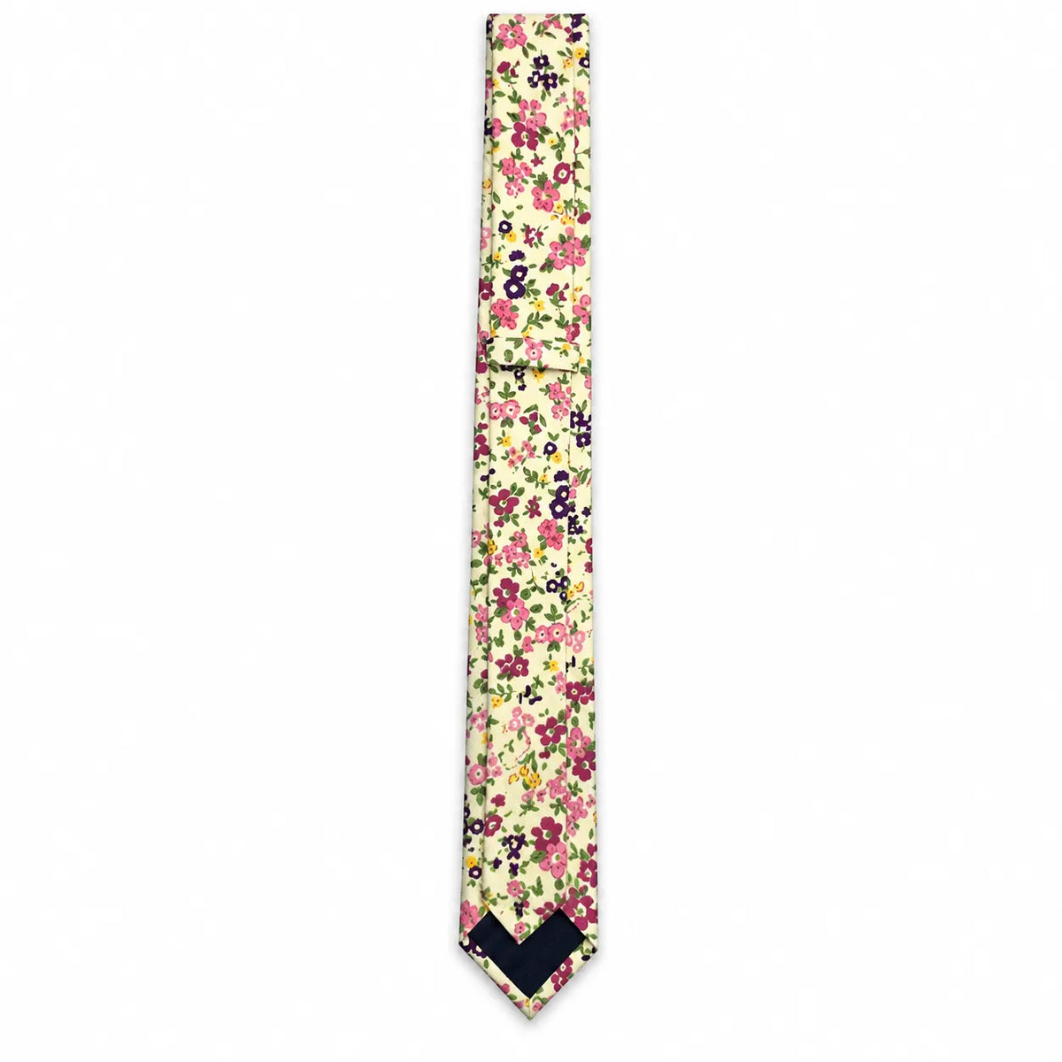 Back layout detail of the berry pink ditsy floral cotton slim necktie showing the keeper loop, lining, and navy tipping on a white background   