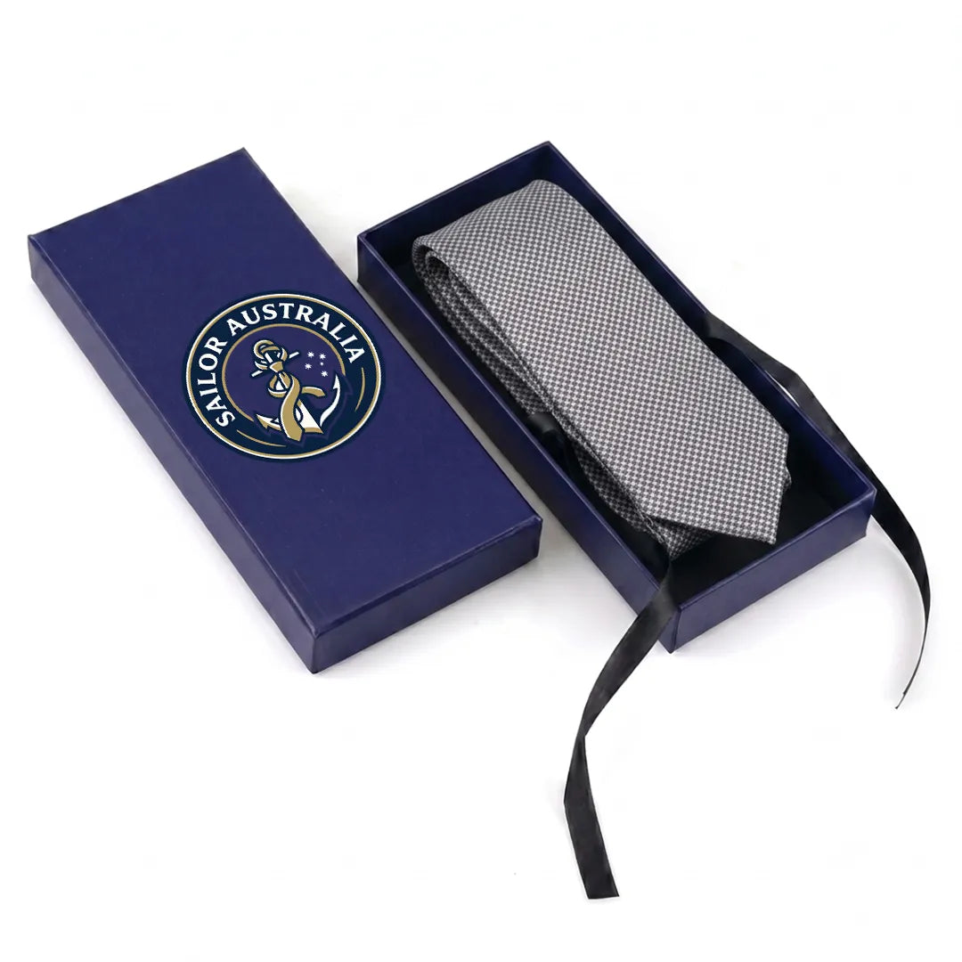 Sailor Australia black and white micro-check cotton skinny tie displayed inside its premium branded navy blue gift box.