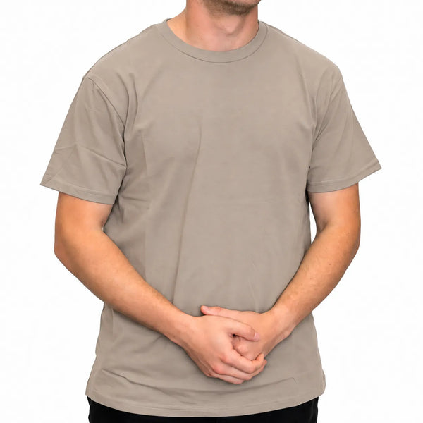 Front view of male model in studio wearing a classic fit grey crew neck cotton t-shirt