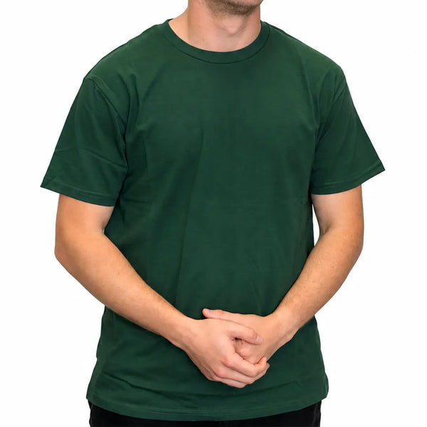 Front view of a man wearing a classic pine green short-sleeve crew neck t-shirt.